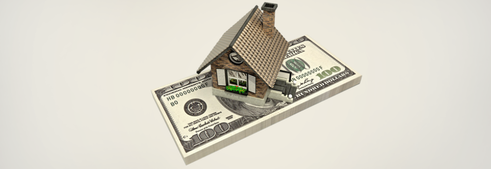 A model home on dollar bills
