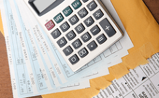 Calculator and paperwork