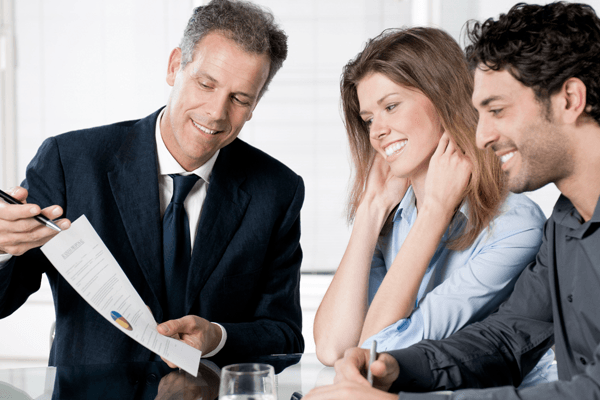 Homeowners reviewing documents